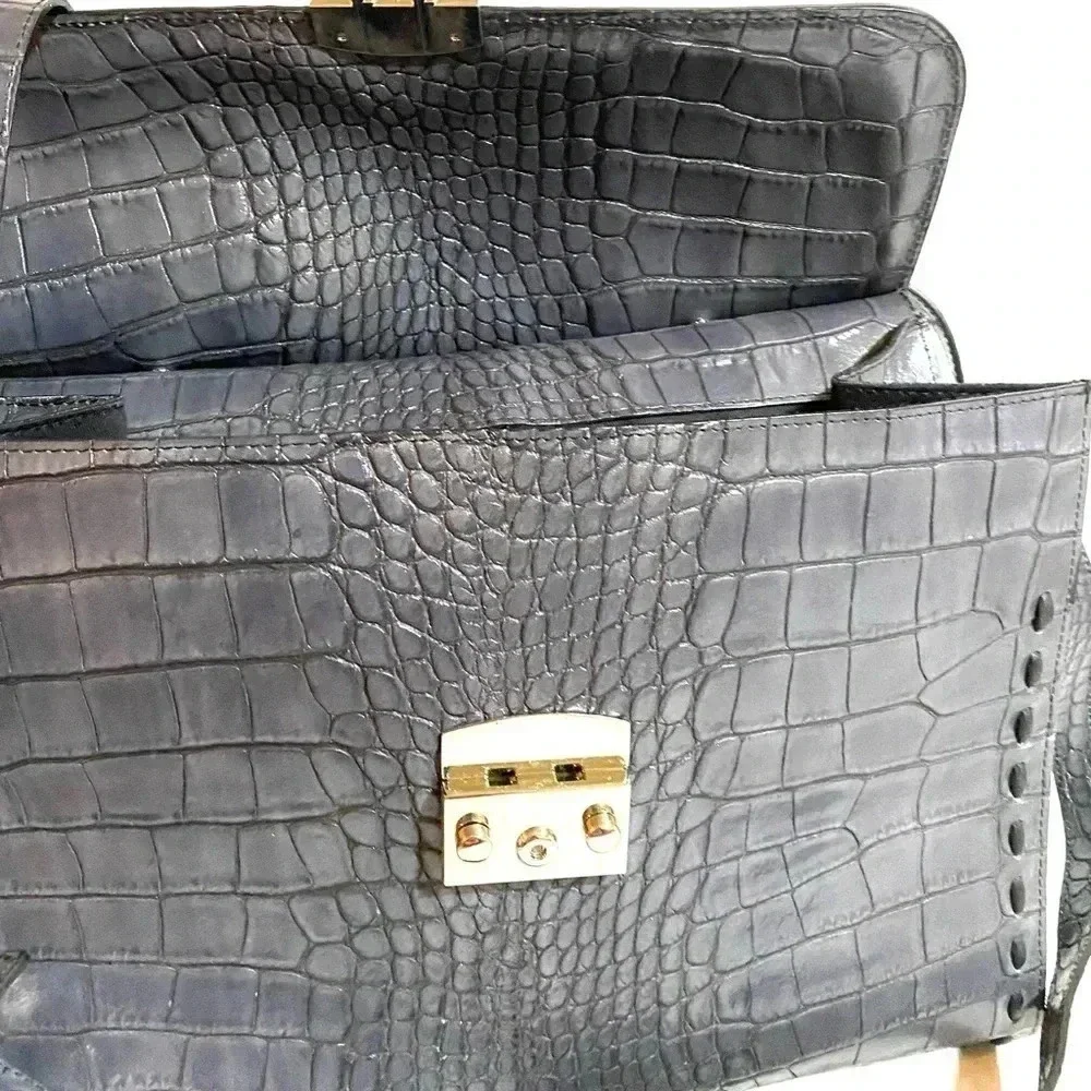 Claudia Firenze embossed crocodile handbag